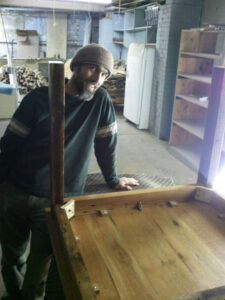 Donn posing with the first Virgin Timber Lumber dining table in 2011